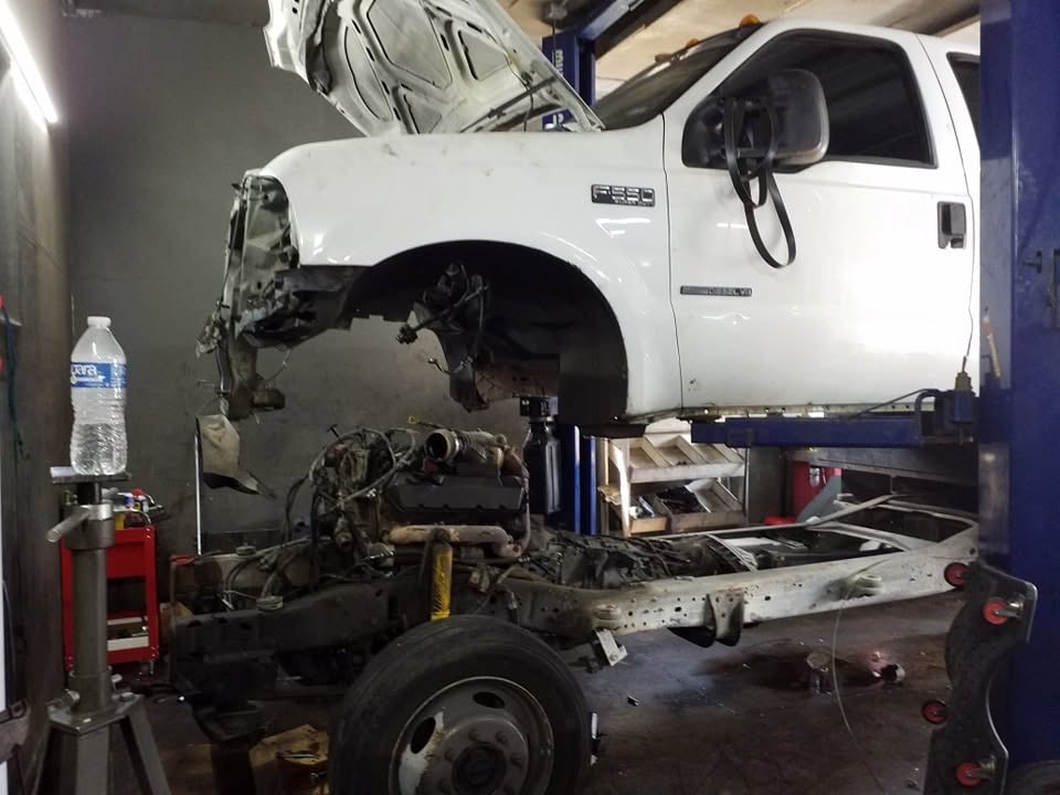 Truck body raised in a repair shop