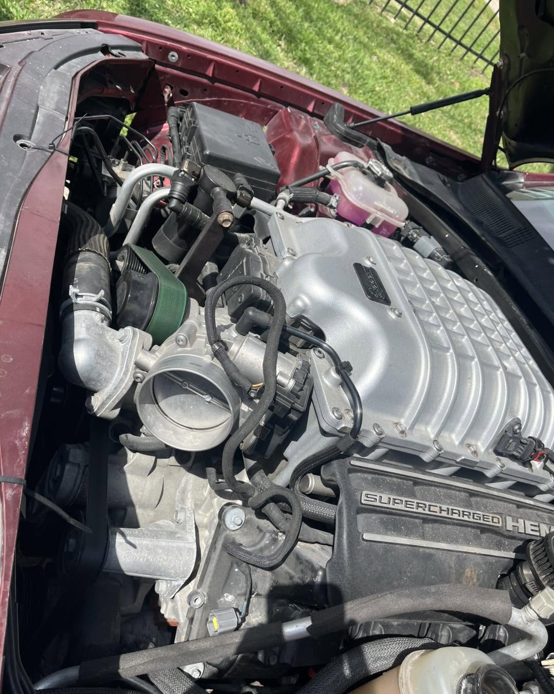 Supercharged engine in a vehicle serviced by Julian Performance & Auto Repair